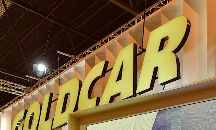 El logotipo de Goldcar, en un stand de la compañía en una feria de muestras, en Madrid. // FOTOGRAFÍA: F. A. / FLEET PEOPLE Goldcar, Europcar